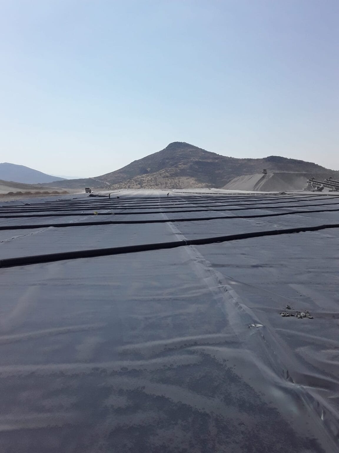 Corrugated drainage pipe deployment at the base of Kışladağ Gold Mine heap leach pad